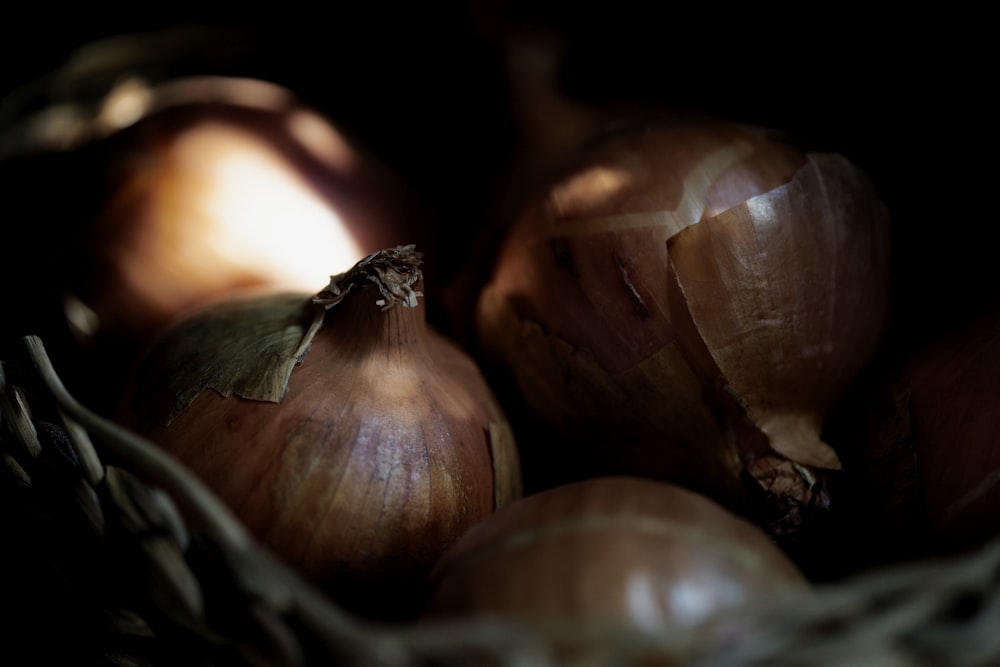 brown garlic on black background