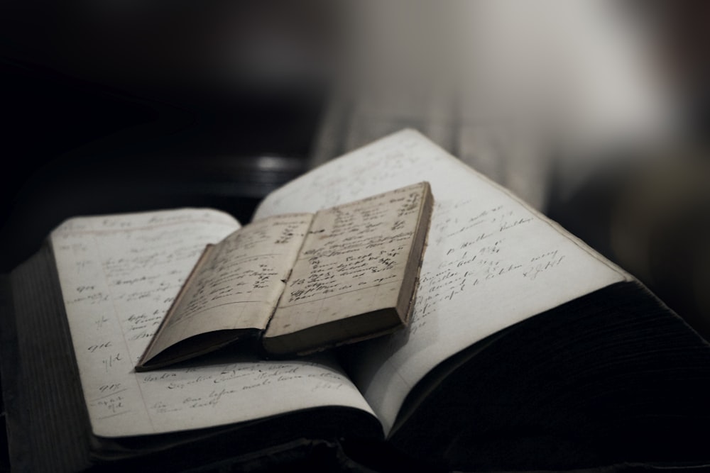 white book page on black table