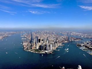 city skyline under blue sky during daytime