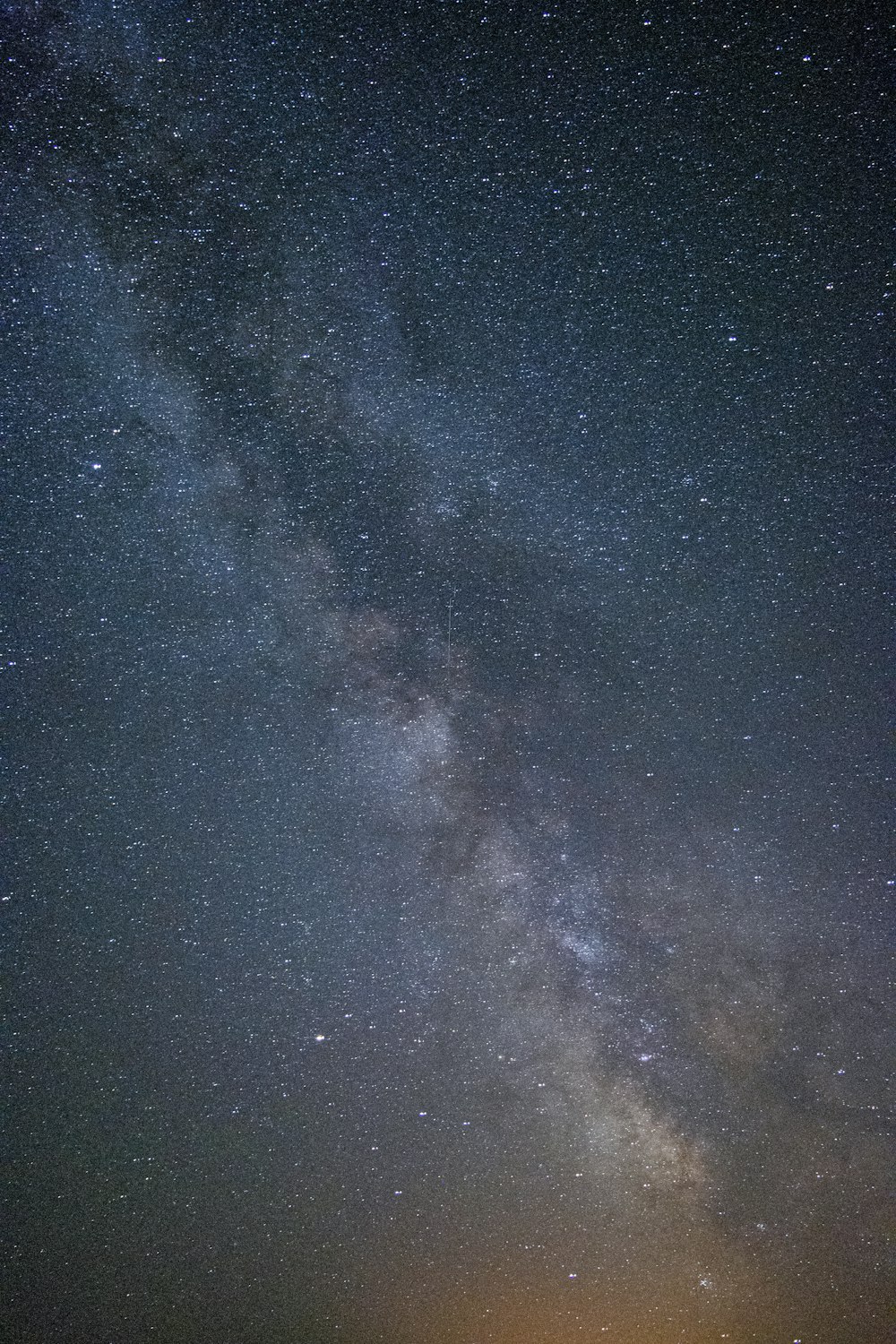 blue and black starry night sky