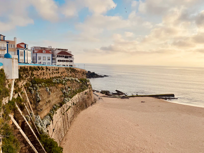 White and red building above the sea at Ericeira