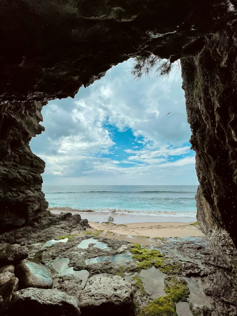 brown rock formation near sea during daytime