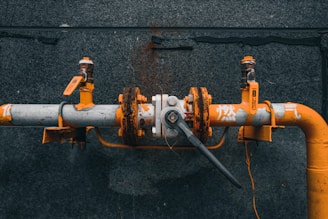 orange and black metal pipe