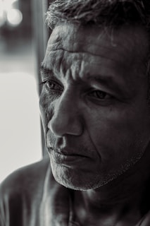 man in black frame eyeglasses