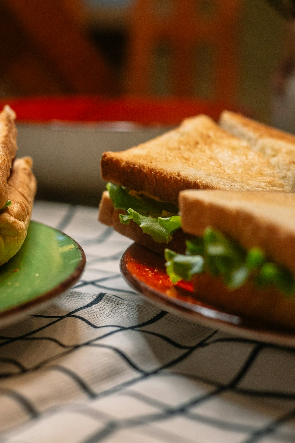 bread on green and white ceramic plate