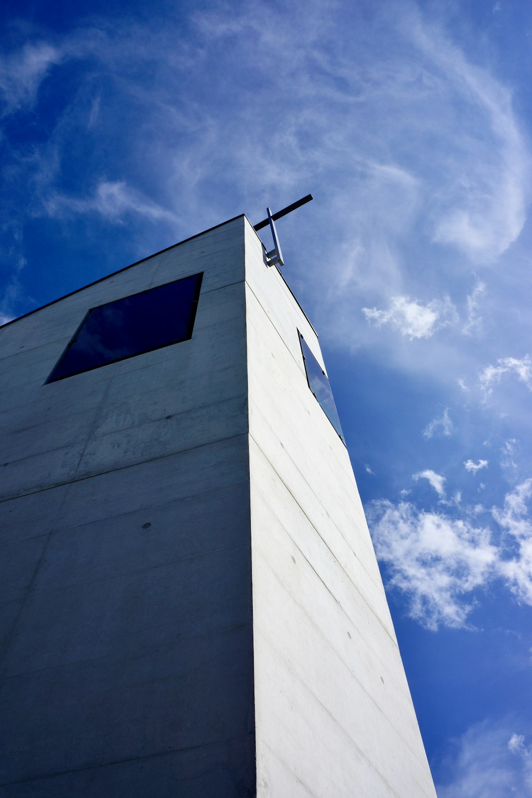 white concrete building under blue sky during daytime