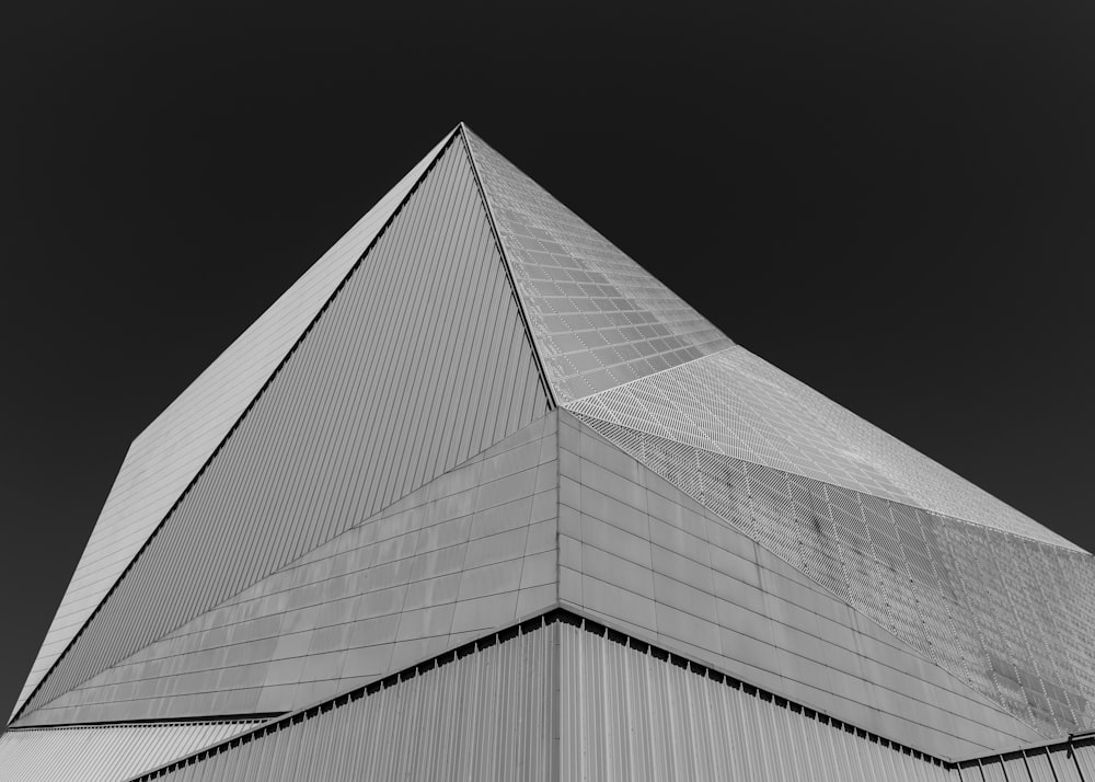 grayscale photo of glass building