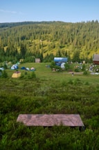 A serene campsite with tents set up in nature.