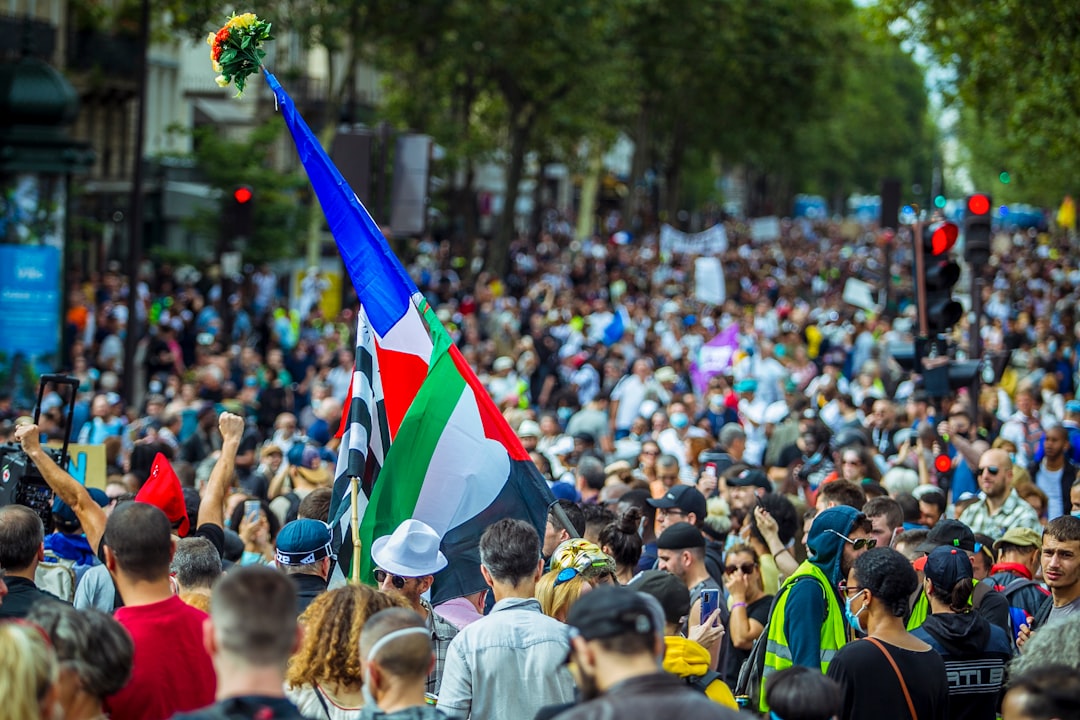 people gathering in a event with flags