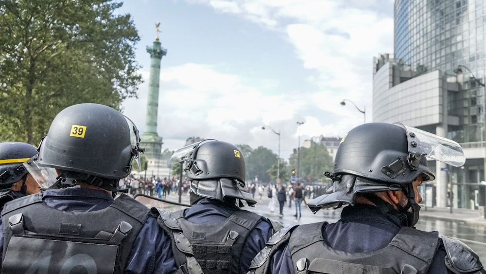 people in black helmet and black jacket