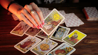 A serene hand holding a single tarot card glowing softly against a dark background.