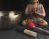 brass buddha figurine beside red and white stick