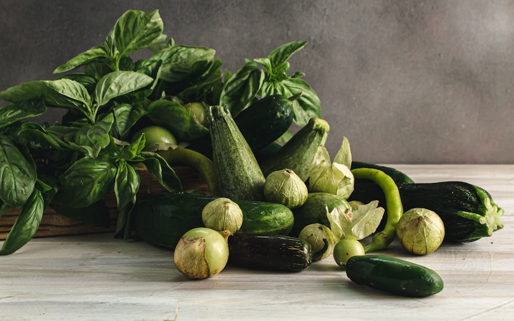 green vegetable on white wooden table