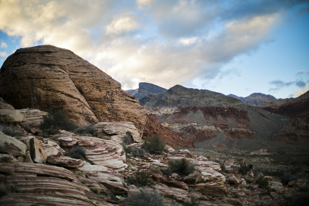 brown rocky mountain under blue sky during daytime