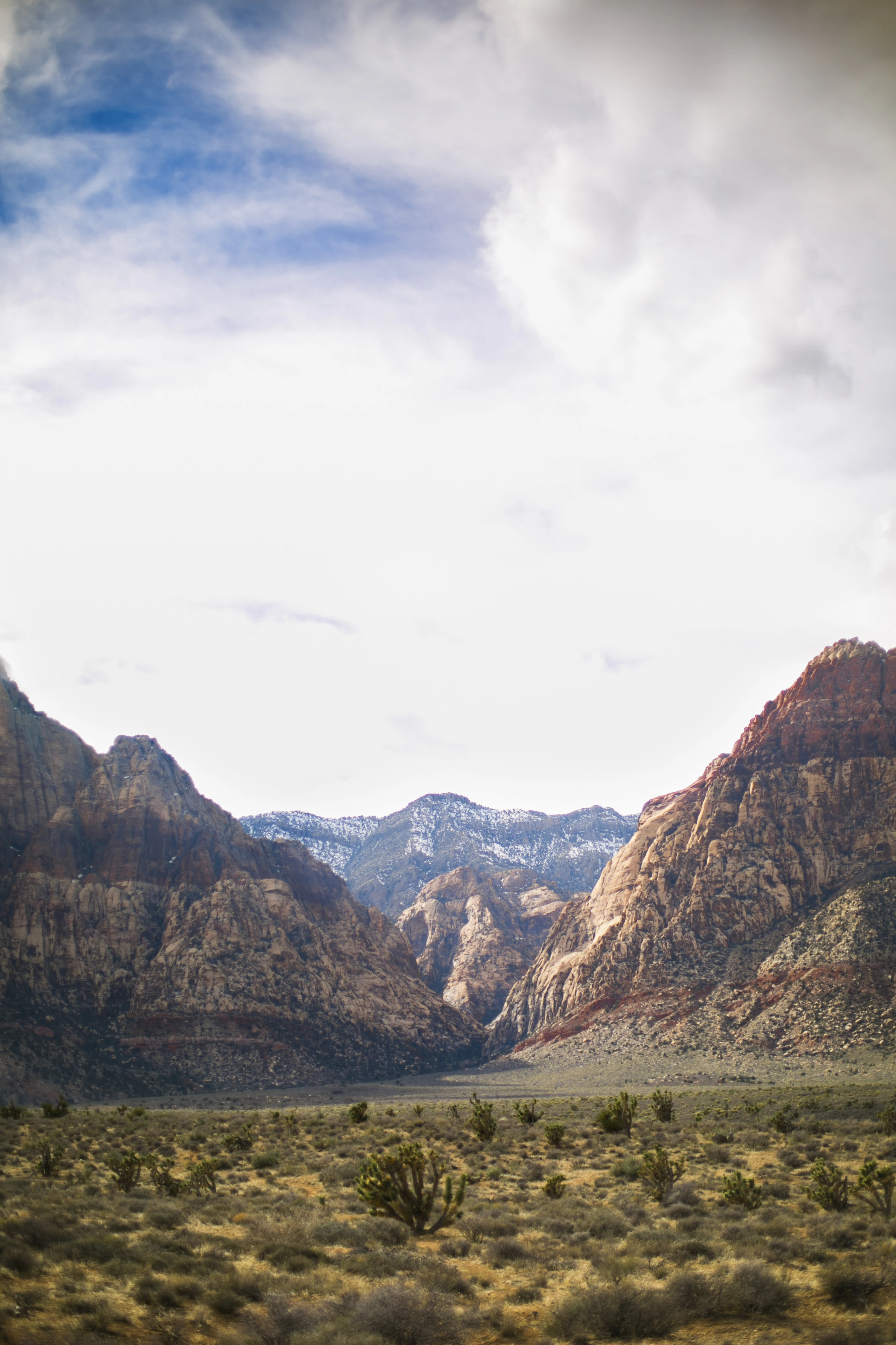 Red Rock Canyon west of Las Vegas, banded red cliffs below snow still lying on the higher peaks