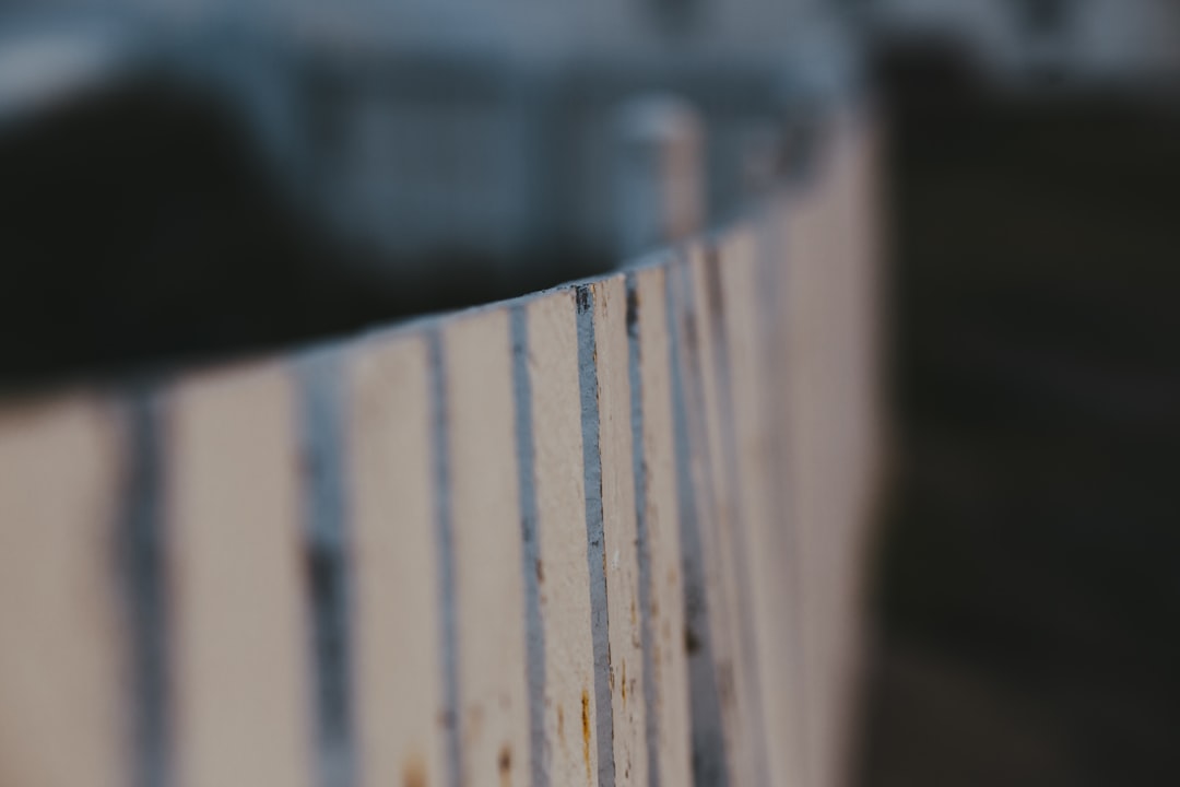 brown wooden fence in close up photography