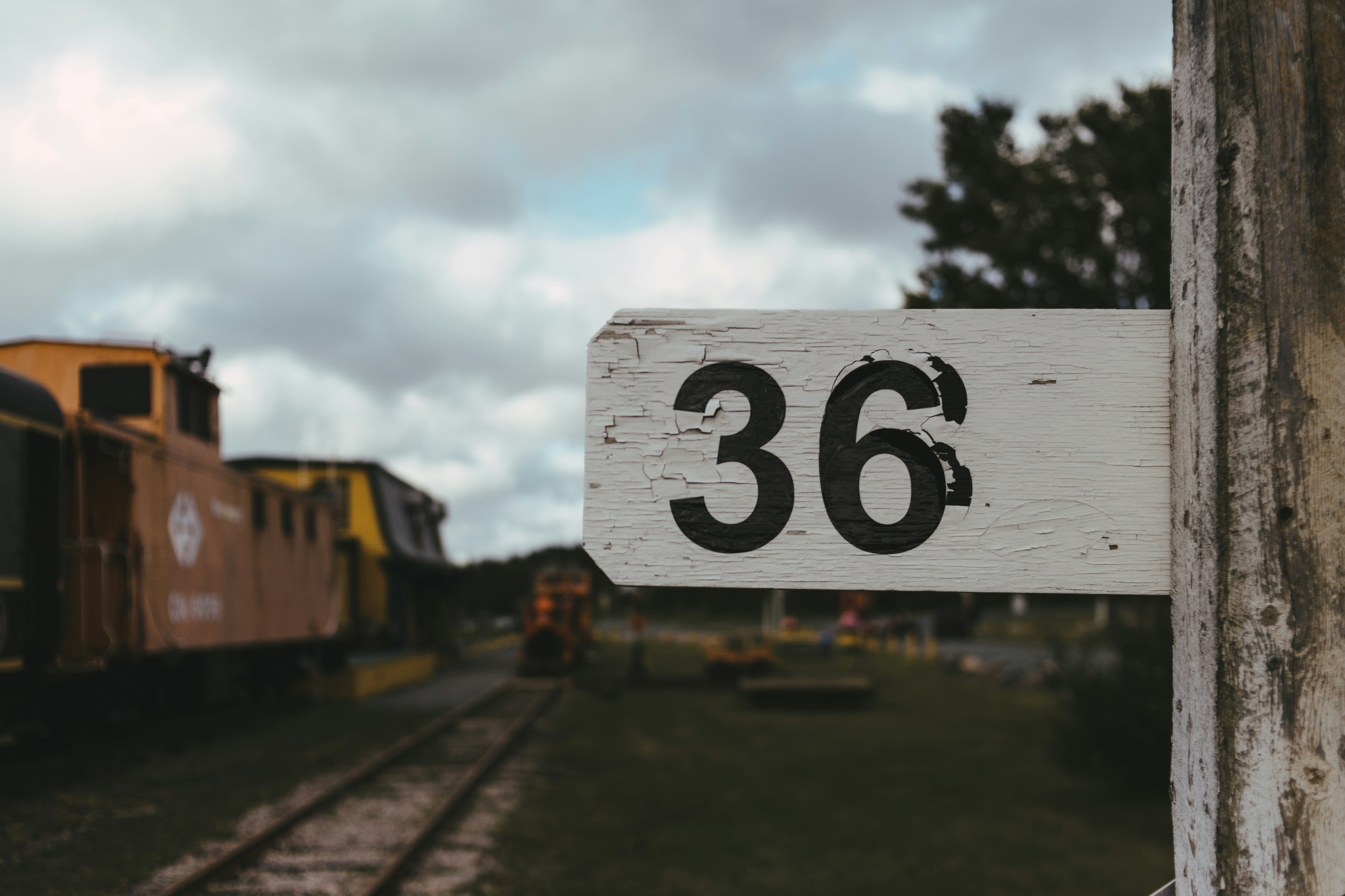 white and black wooden board with number 6