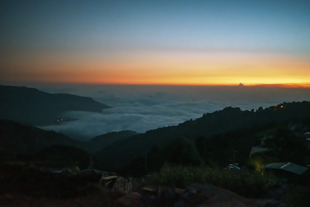 green mountains under blue sky during sunset