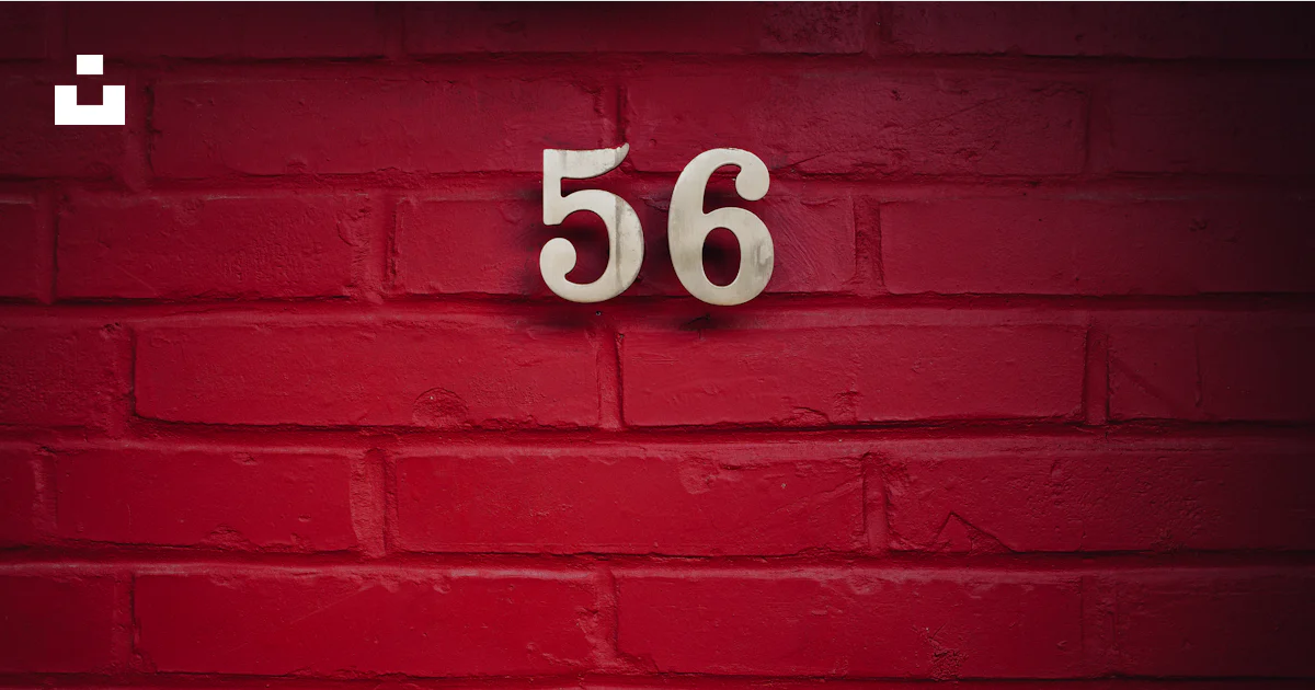 Red Numbers Code Wall A red brick wall with a white number on it photo – Free Red Image on ...