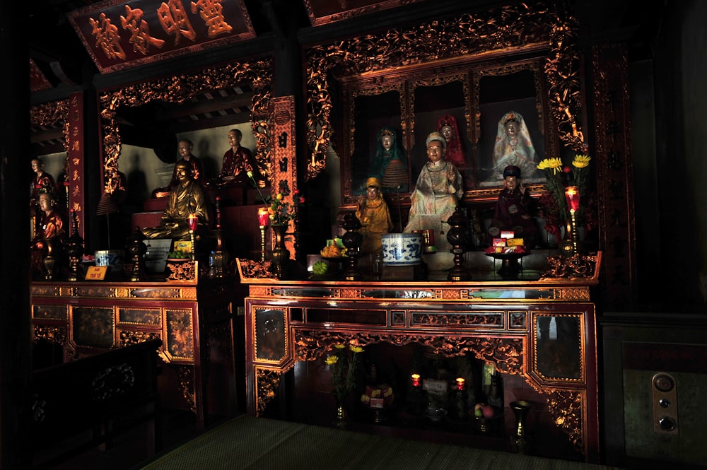 brown wooden table with religious figurine