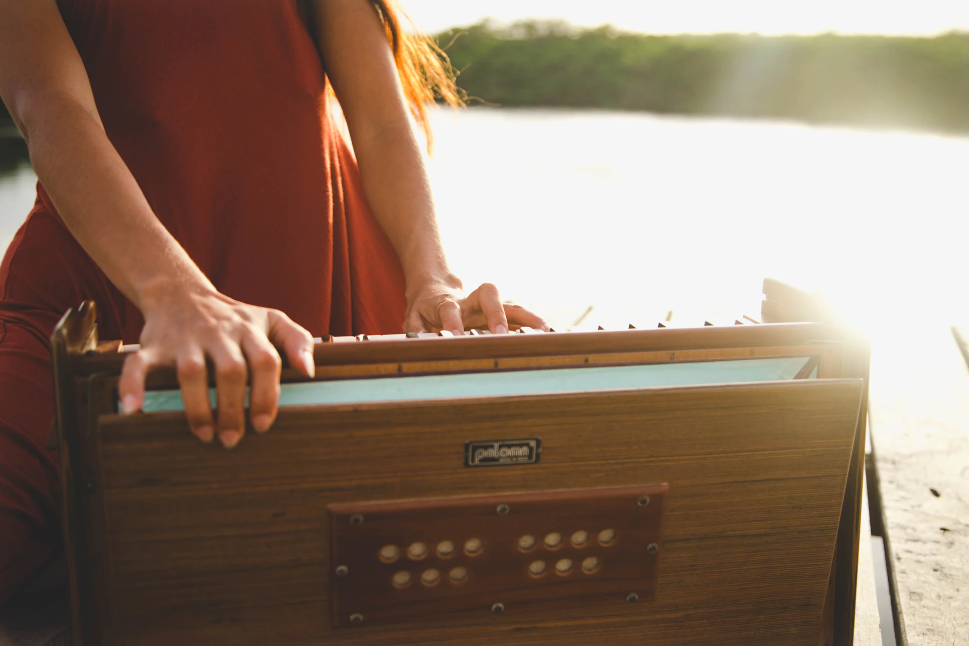 woman in orange sleeveless dress