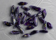 An elegant arrangement of rune stones spread out on a velvet cloth, ready for a spiritual reading.