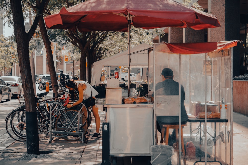 people sitting on chair near table during daytime