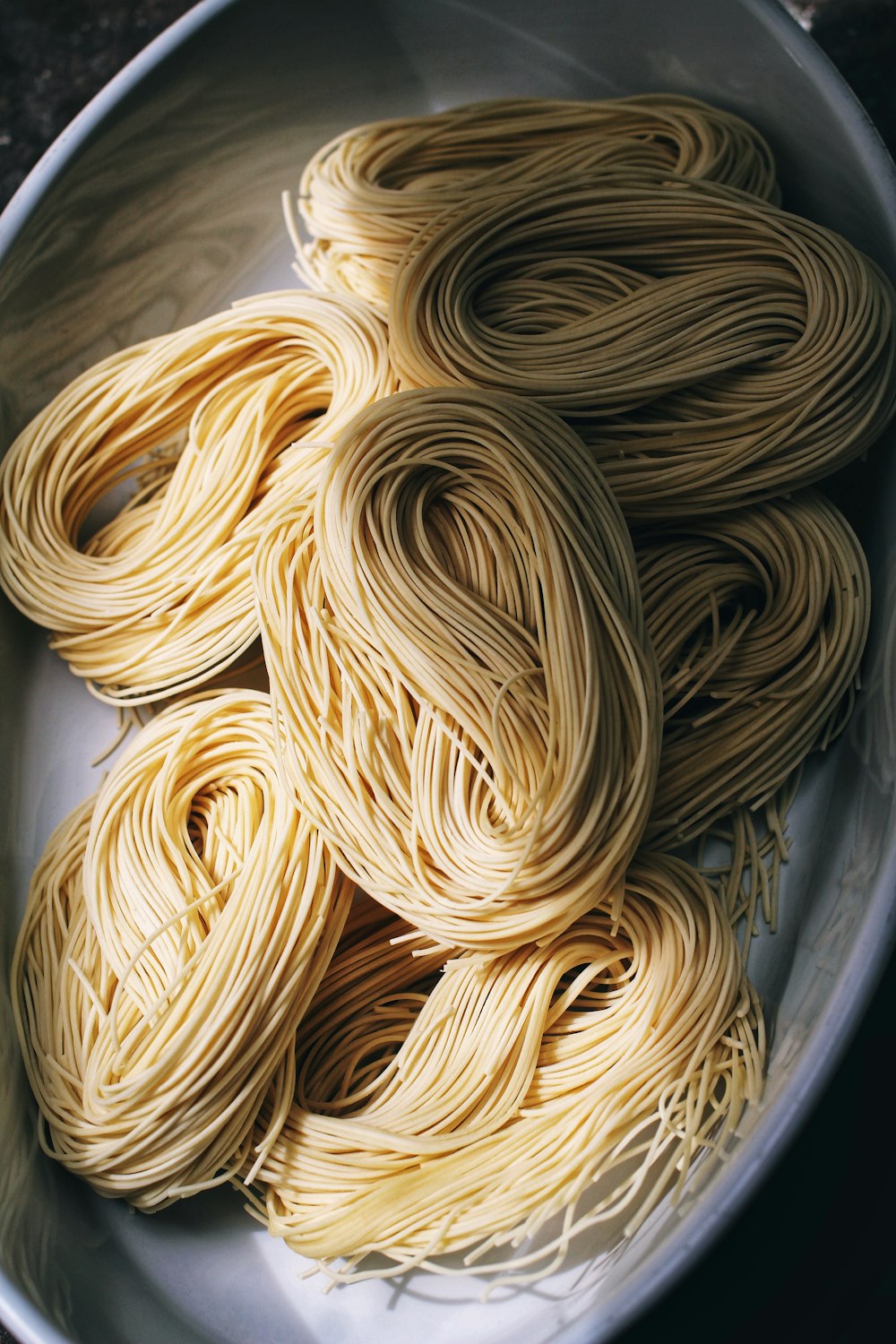 brown rope on gray plastic container