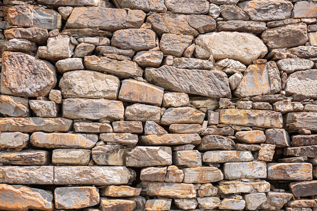 brown and gray stone wall, the wall of an old stone building.<p></figure>Say "Thanks" via PayPal