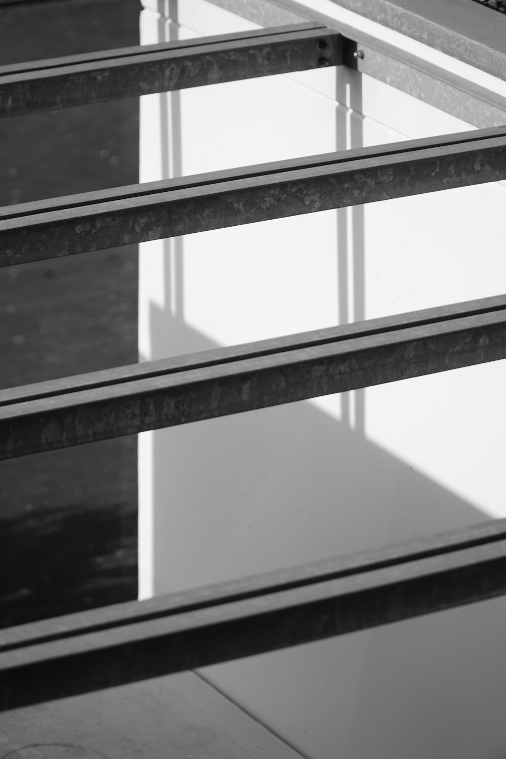 grayscale photo of a glass window