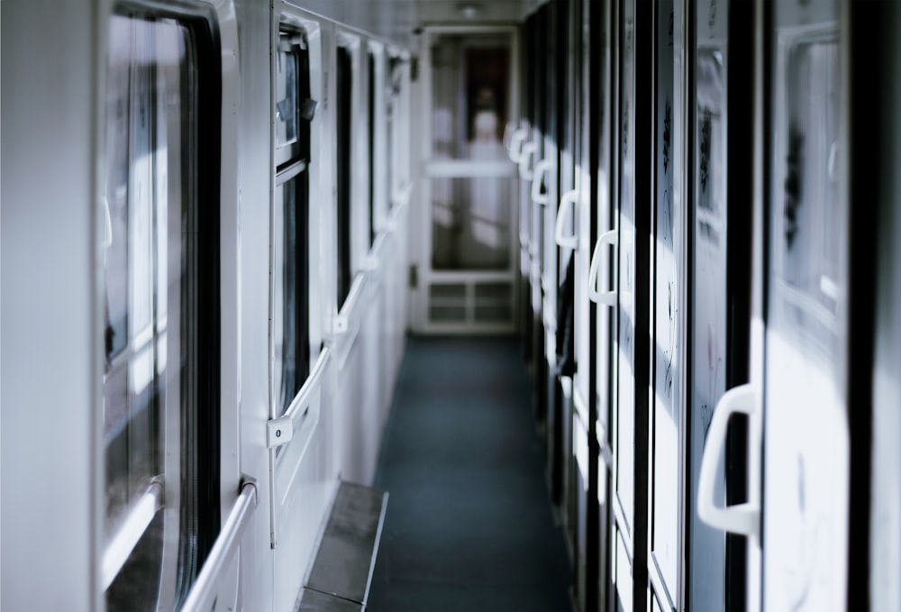 grayscale photo of train interior