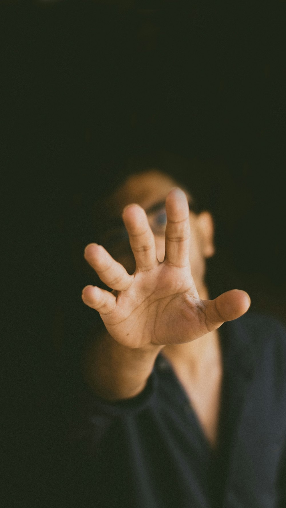 persons hand forming heart