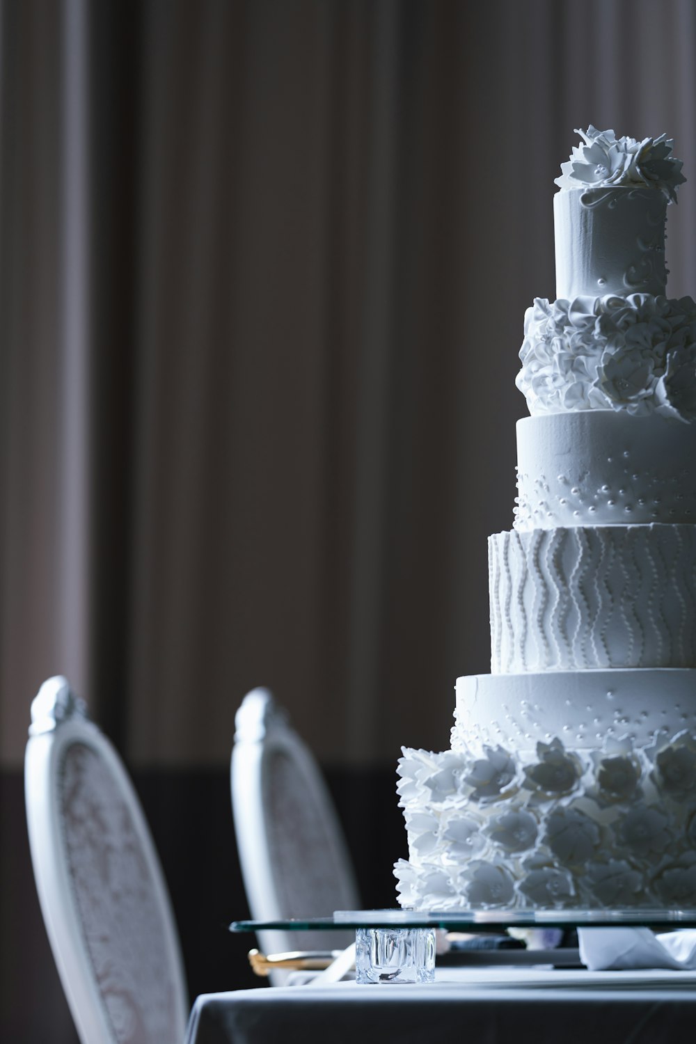 white cake on white table