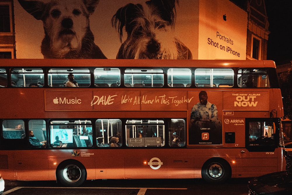 red and white bus with people inside