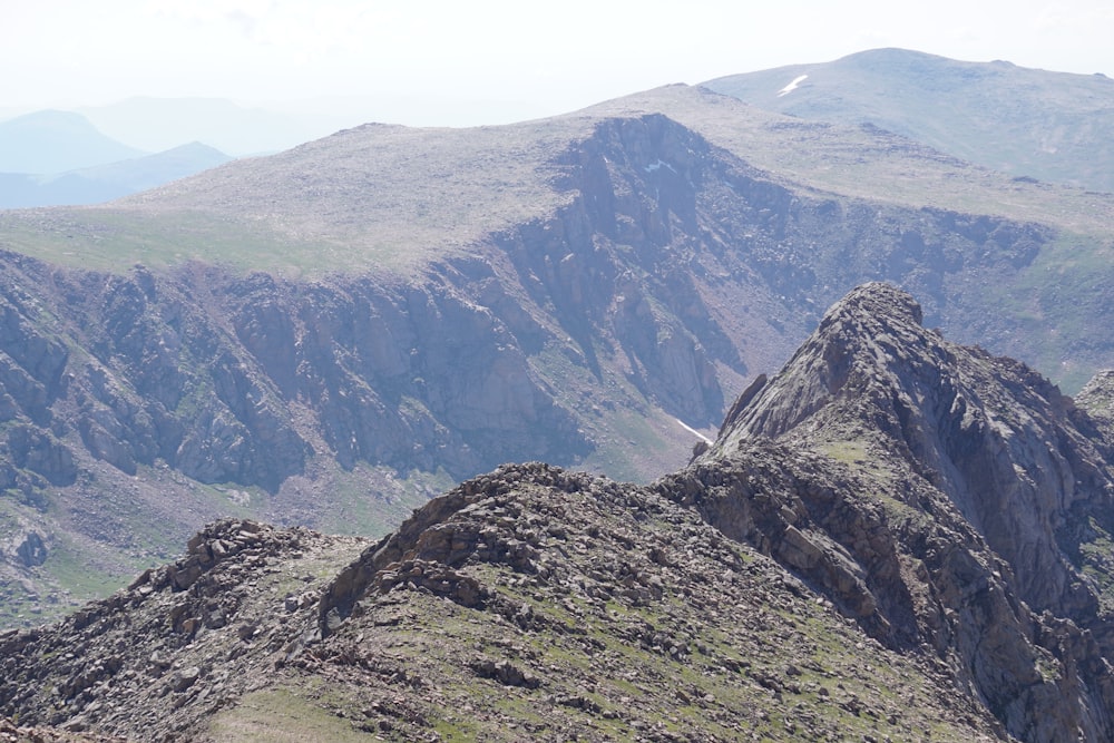 green and brown mountain under blue sky during daytime