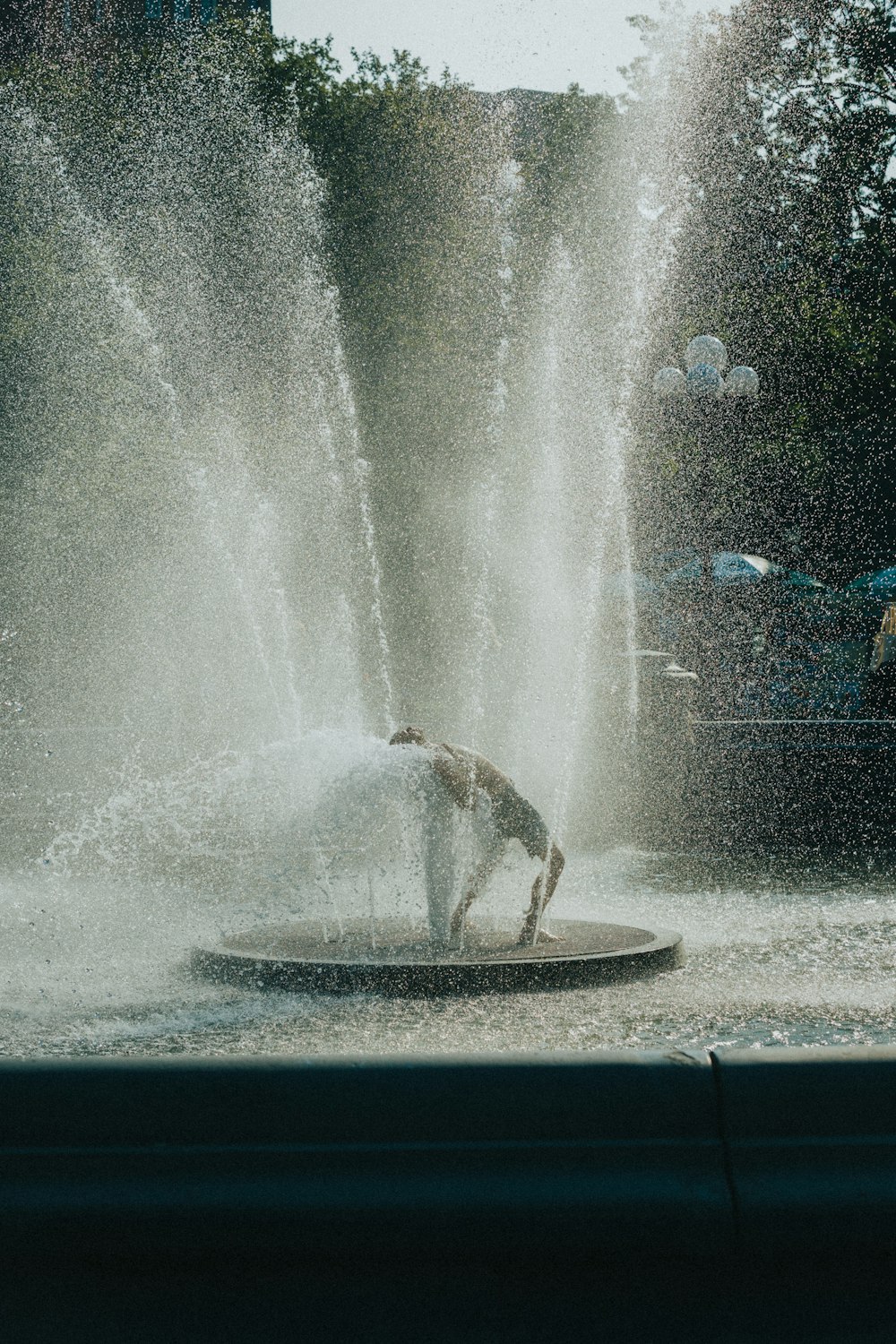 water fountain in the middle of the road