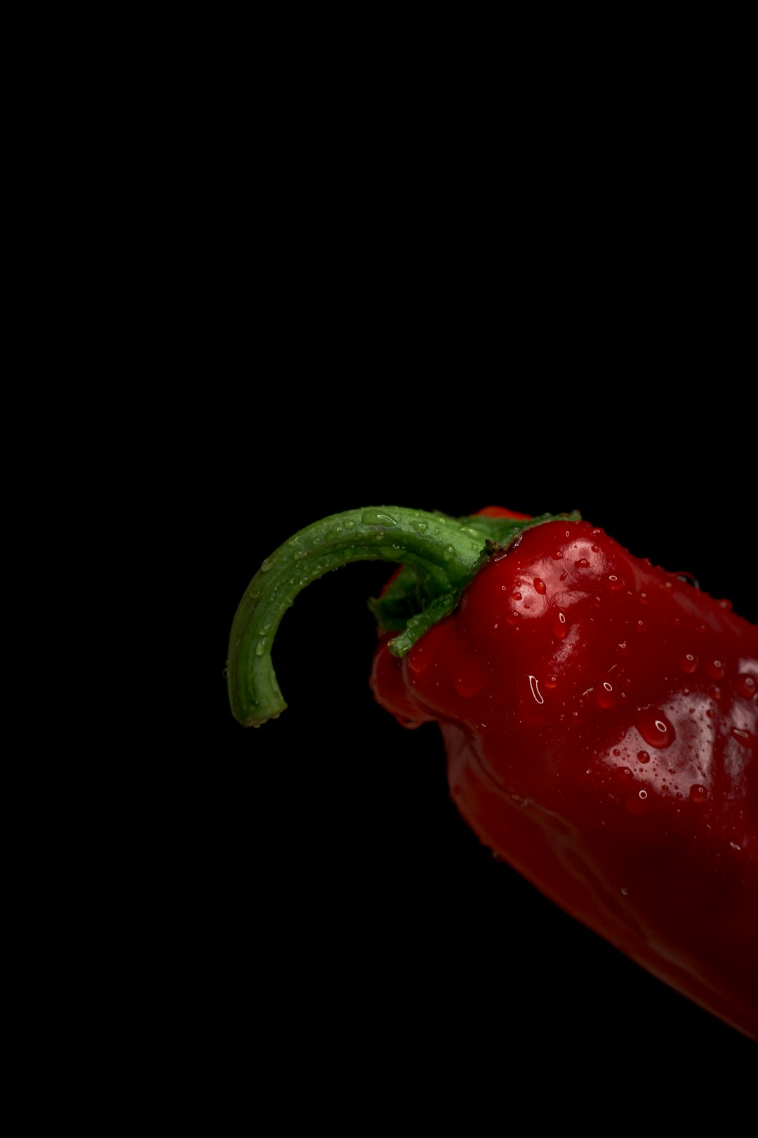 red bell pepper with green stem