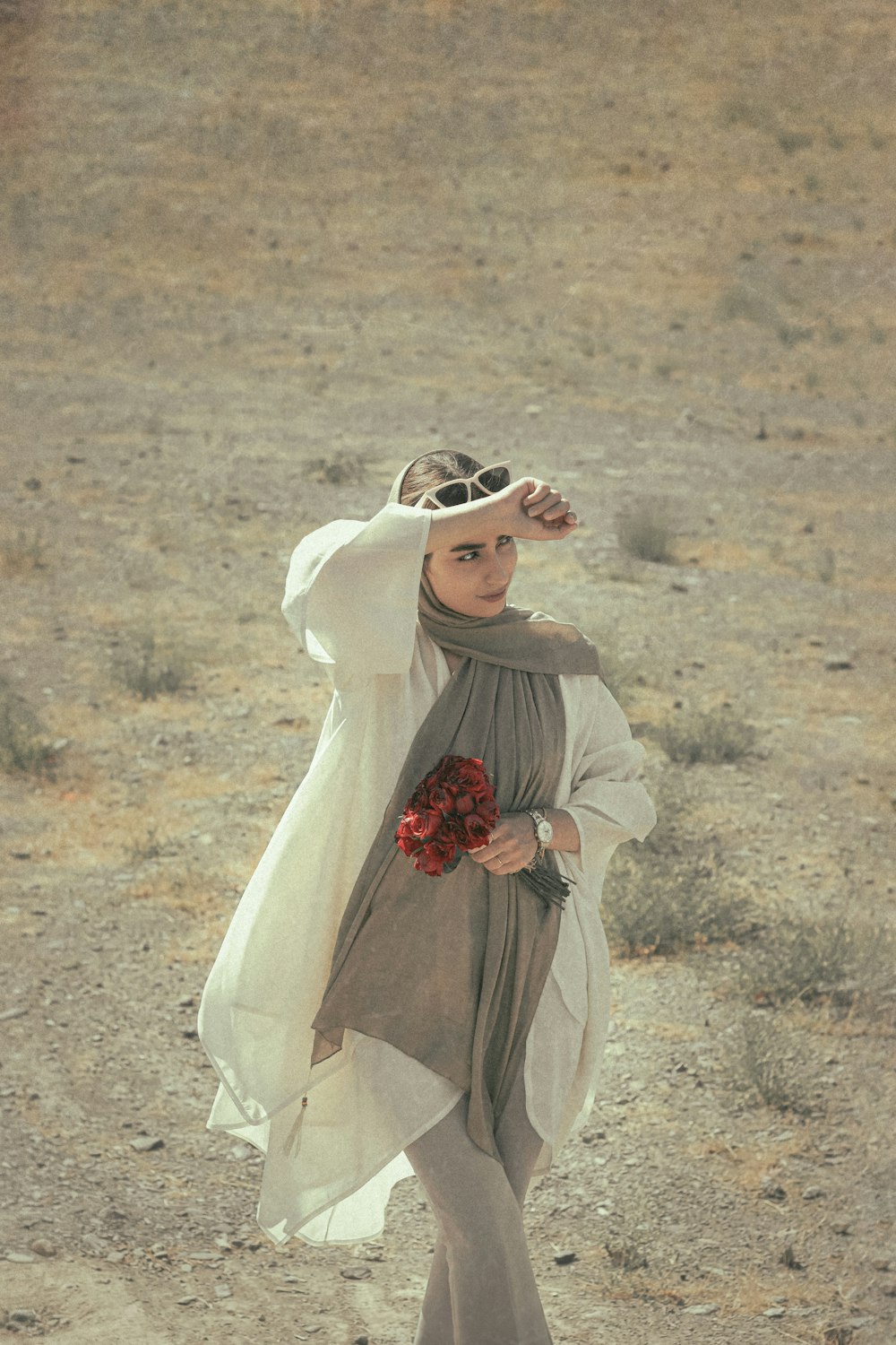 woman in white hijab and brown long sleeve dress