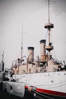 white and brown ship on dock during daytime