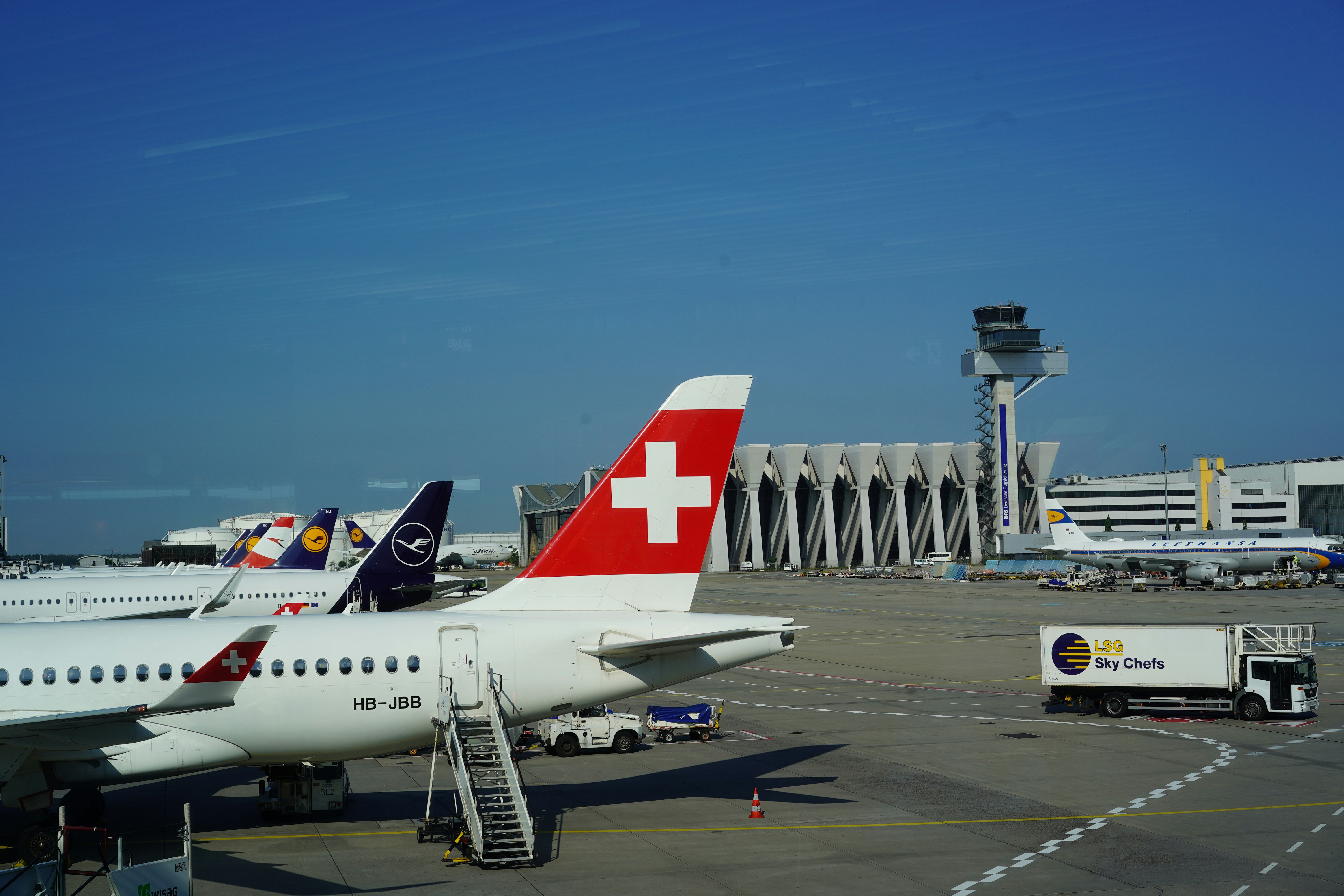 white and red passenger plane on airport during daytime, 