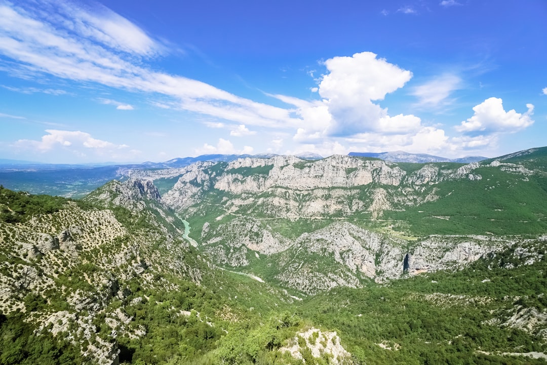 green and gray mountains under blue sky during daytime