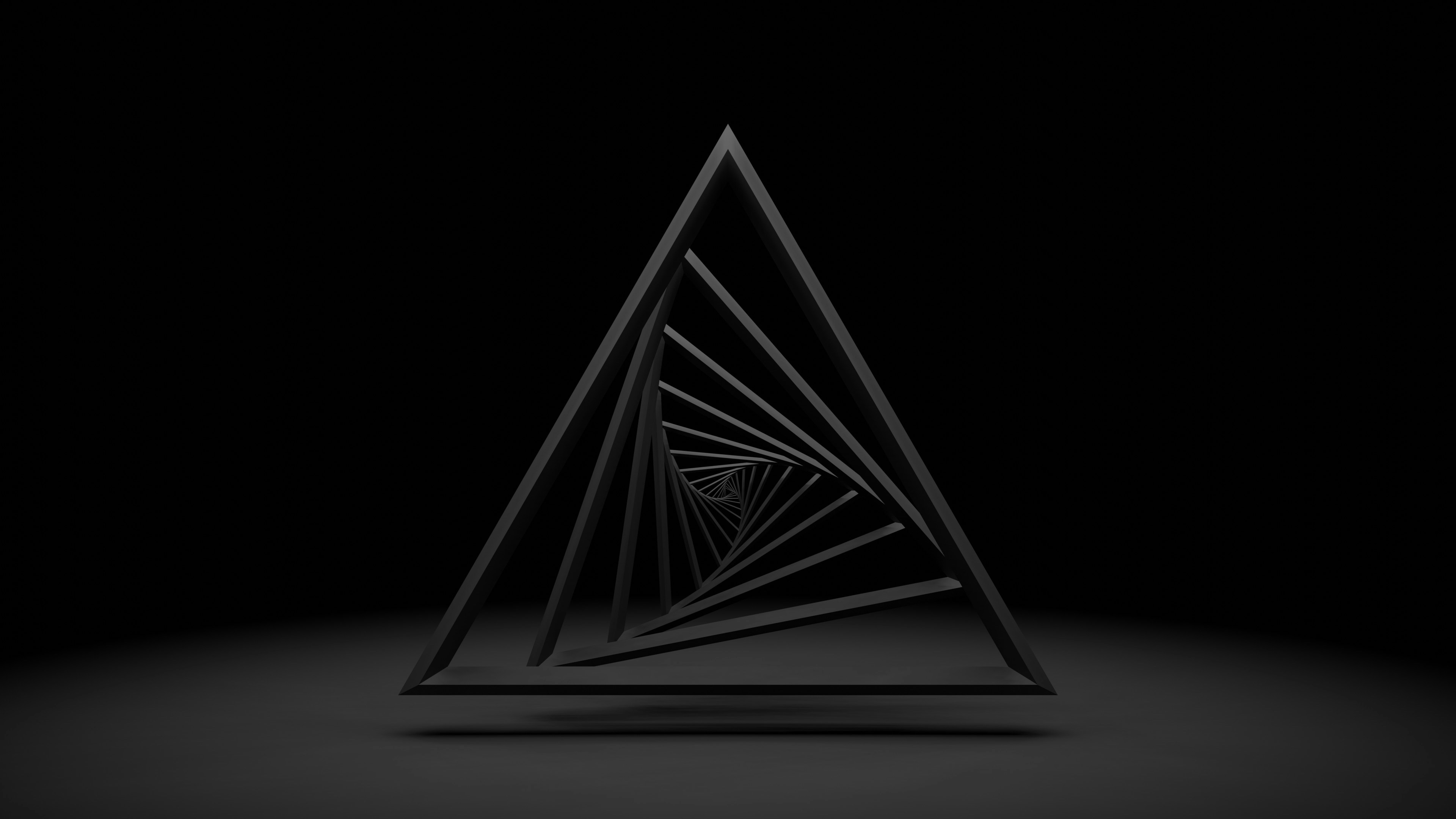 Triangular frames arranged concentrically, creating a tunnel against a dark background.