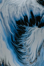 A serene maroon-hued abstract image symbolizing the flow of consciousness.