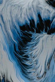 A serene maroon-hued abstract image symbolizing the flow of consciousness.