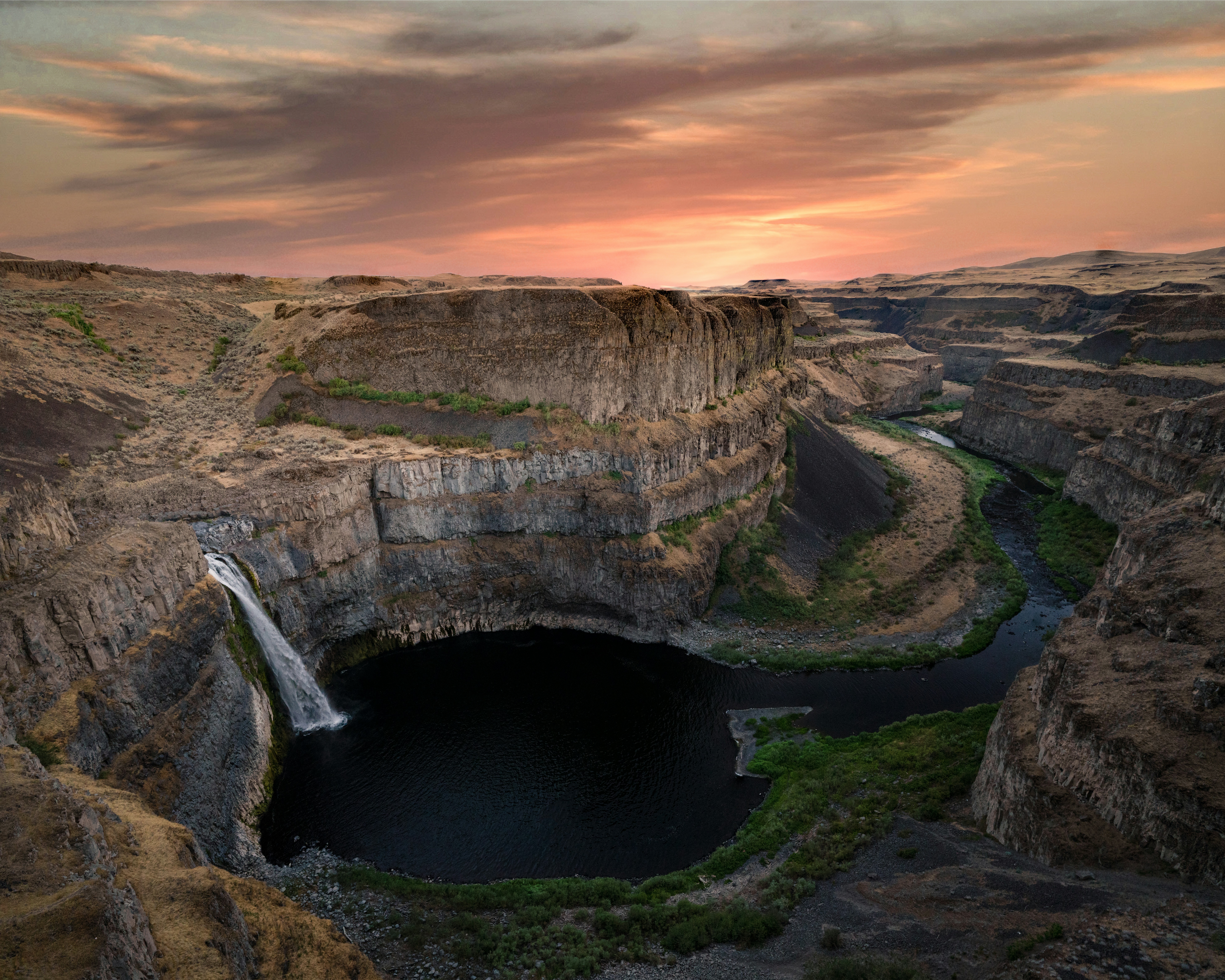 water falls on brown rocky mountain during sunset, Find me on Instagram! @intricateexplorer