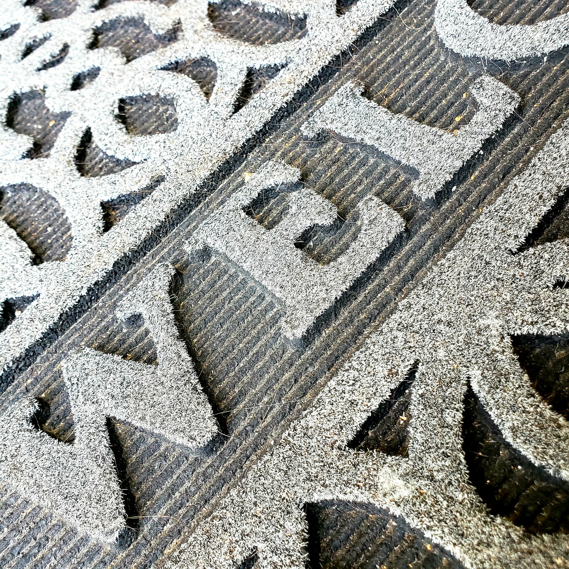 person wearing grey knit sweater