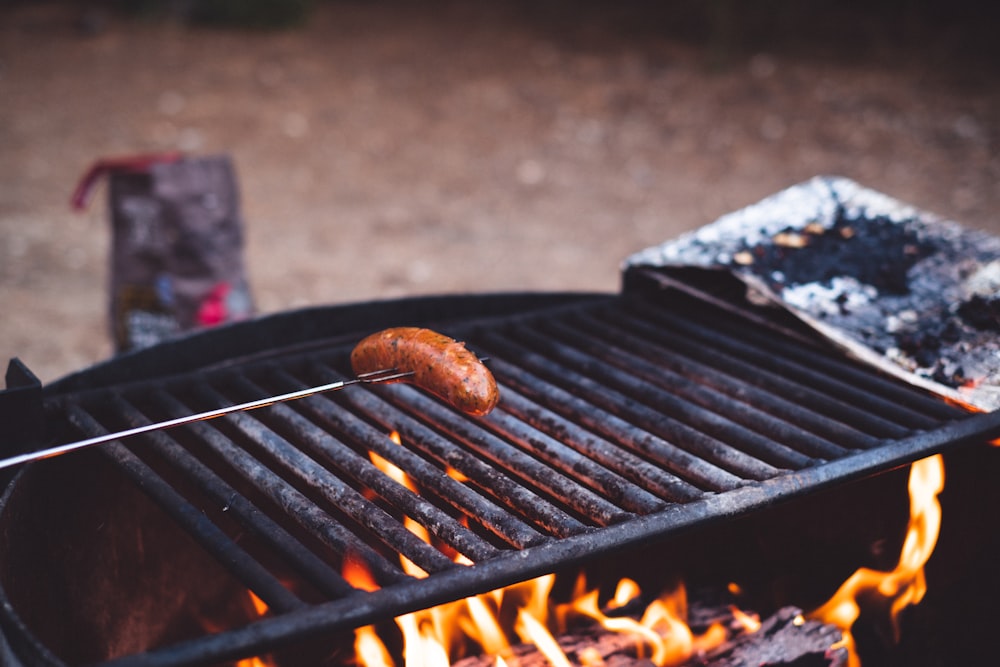 grilled meat on black charcoal grill