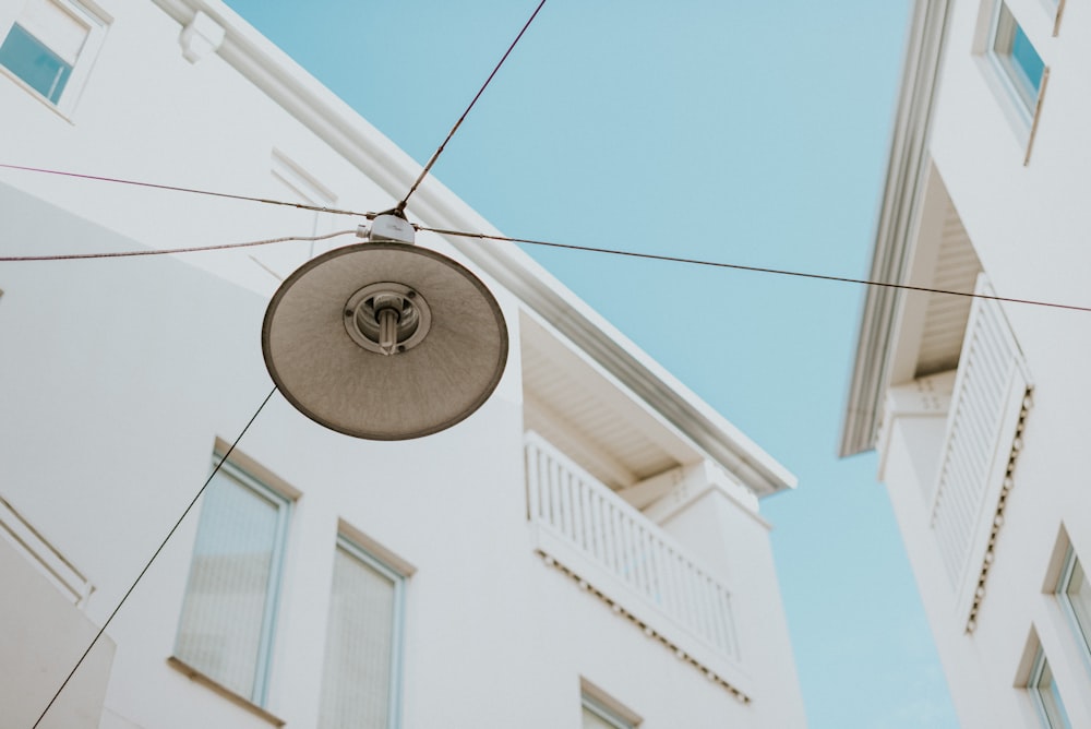 white and black round pendant lamp