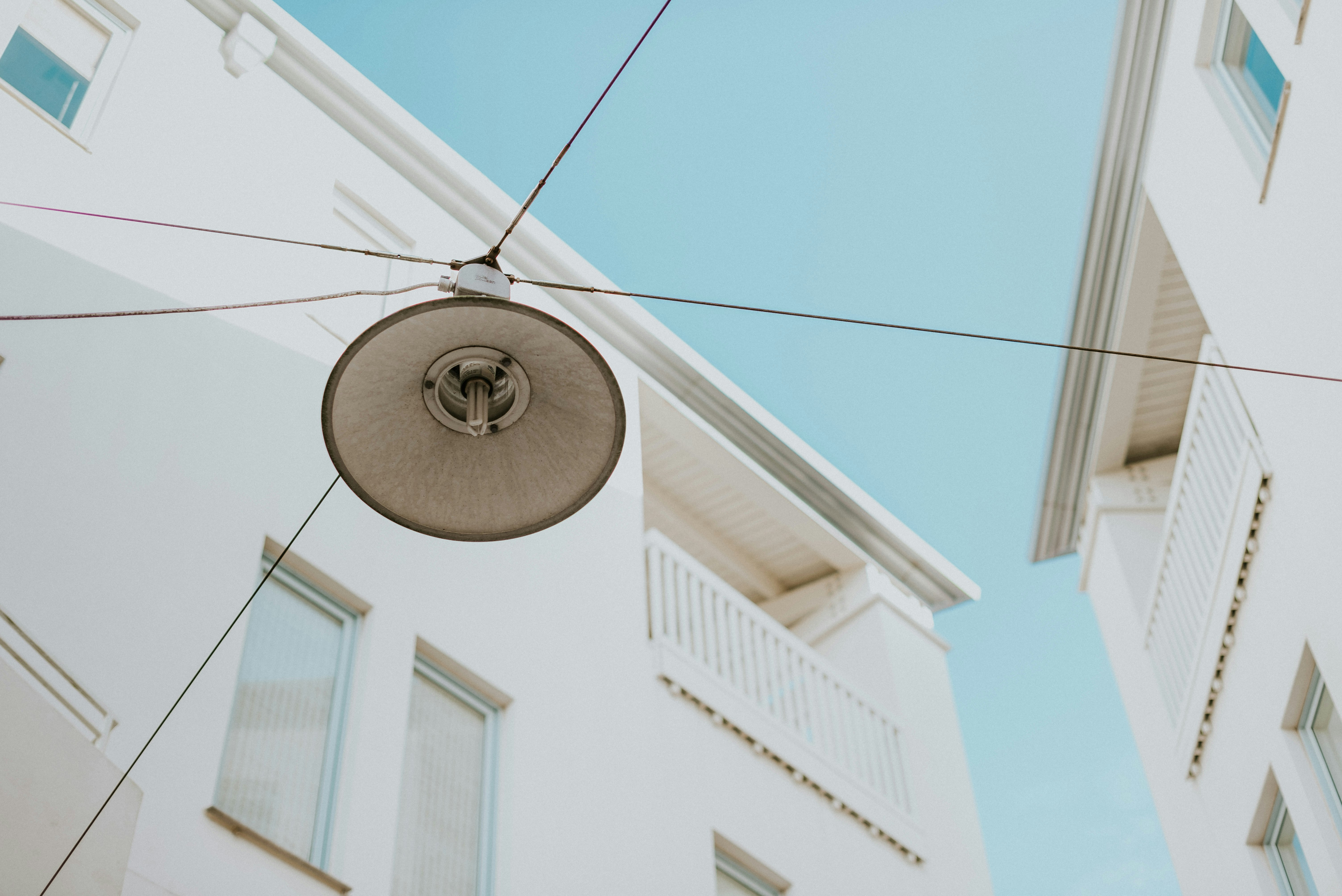 white and black round pendant lamp