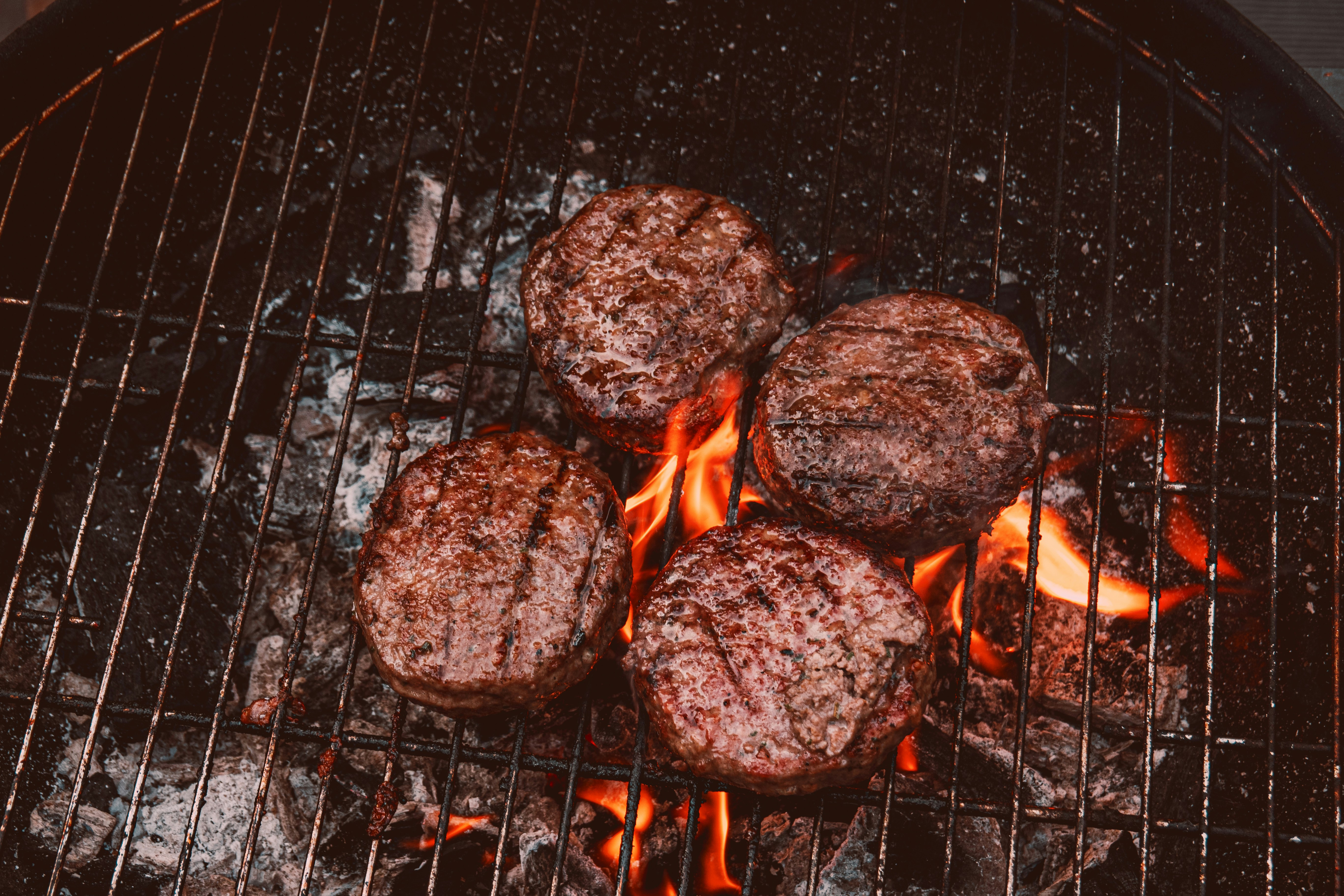 grilled meat on charcoal grill